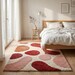 Abstract Wool Area Rug – Burgundy & Mustard Circle Hand Tufted Rug